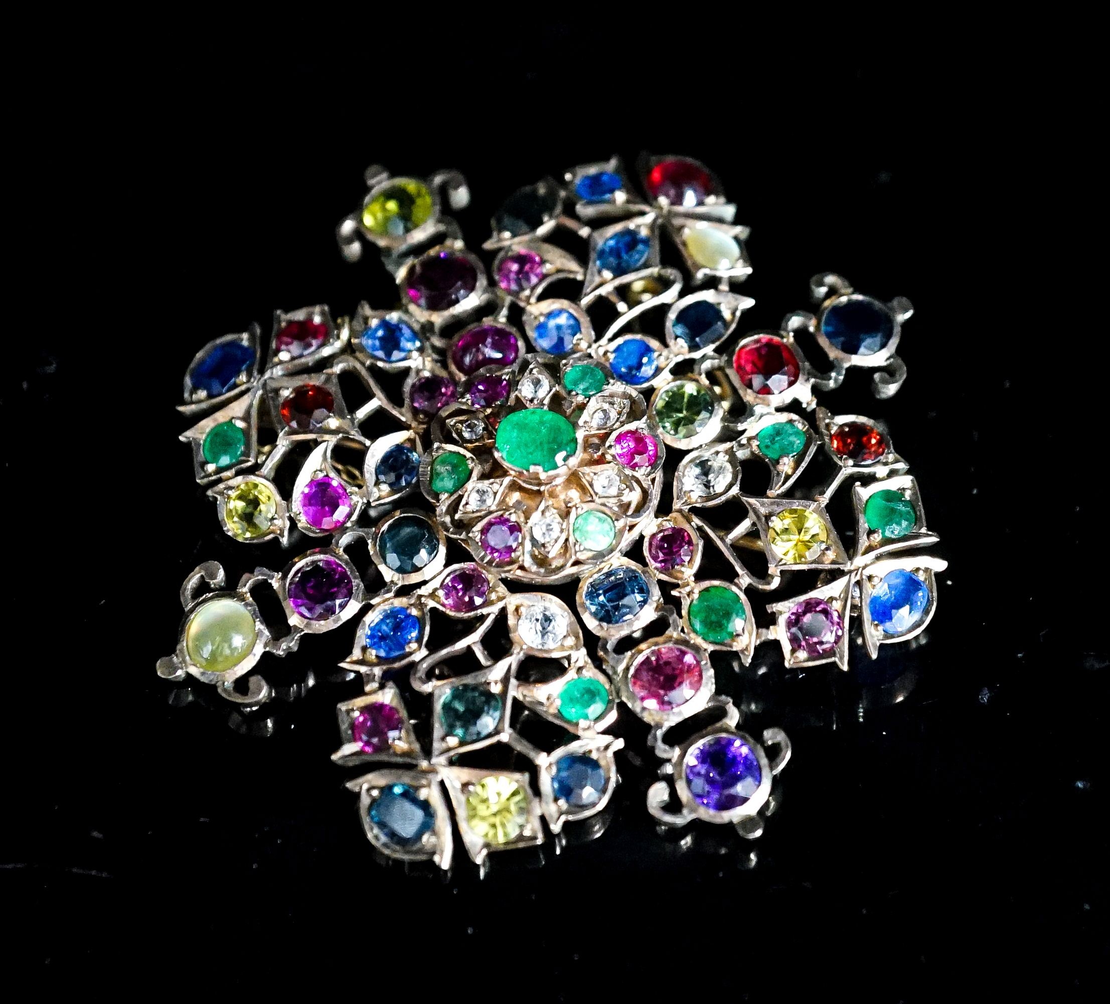 An Indian? yellow metal and multi gem set brooch, diameter 62mm, gross weight 23.9 grams.